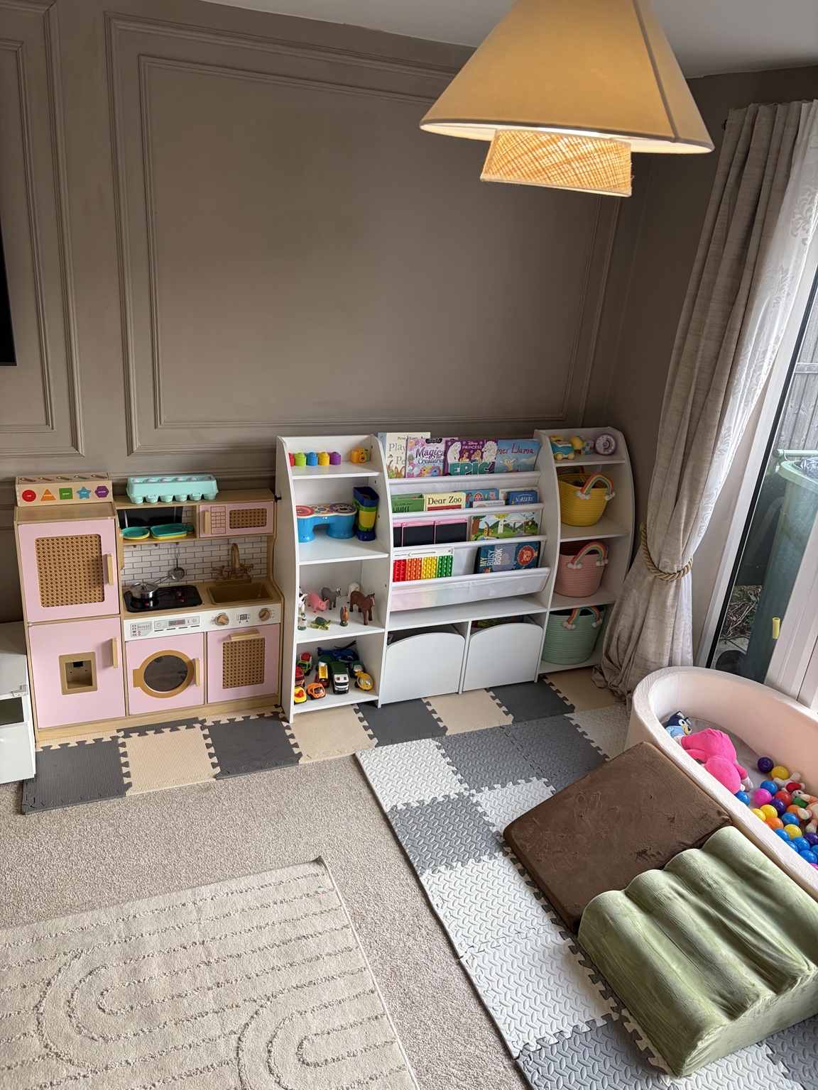 Wide view of our welcoming playroom and soft play area